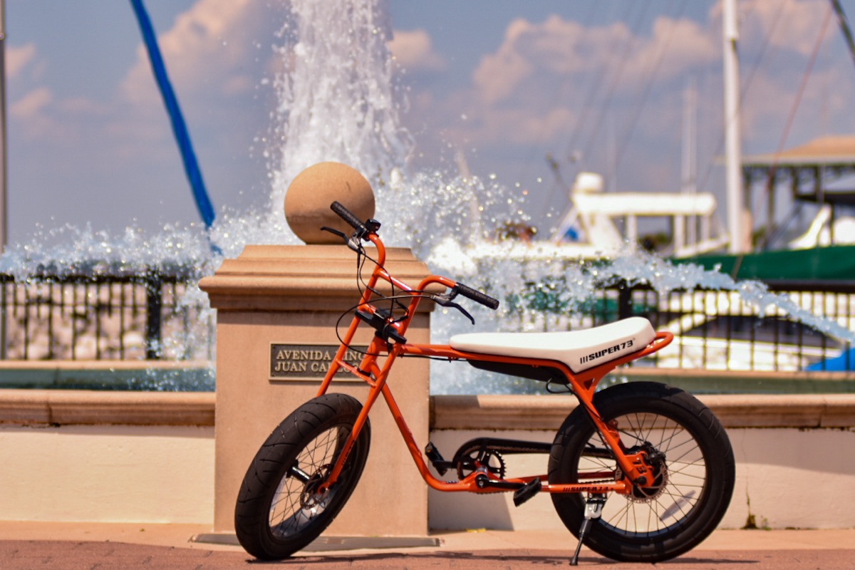 Super73 electric bike parked by the fountain at Pensacola's marina